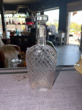 Antique diamond cut glass whiskey flask usually produced in the 1870s and 1910